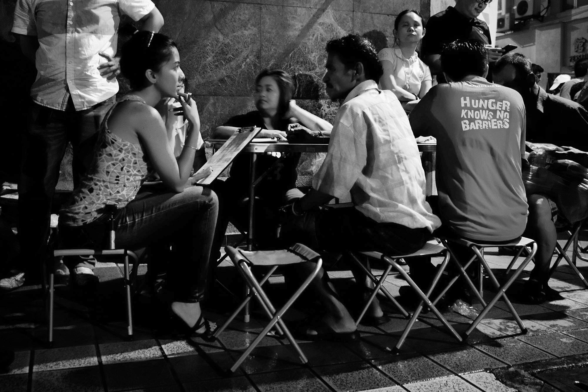 Volunteer Shalini Yeap helping out (Photo by Kamal Sellehuddin/Coconuts KL)