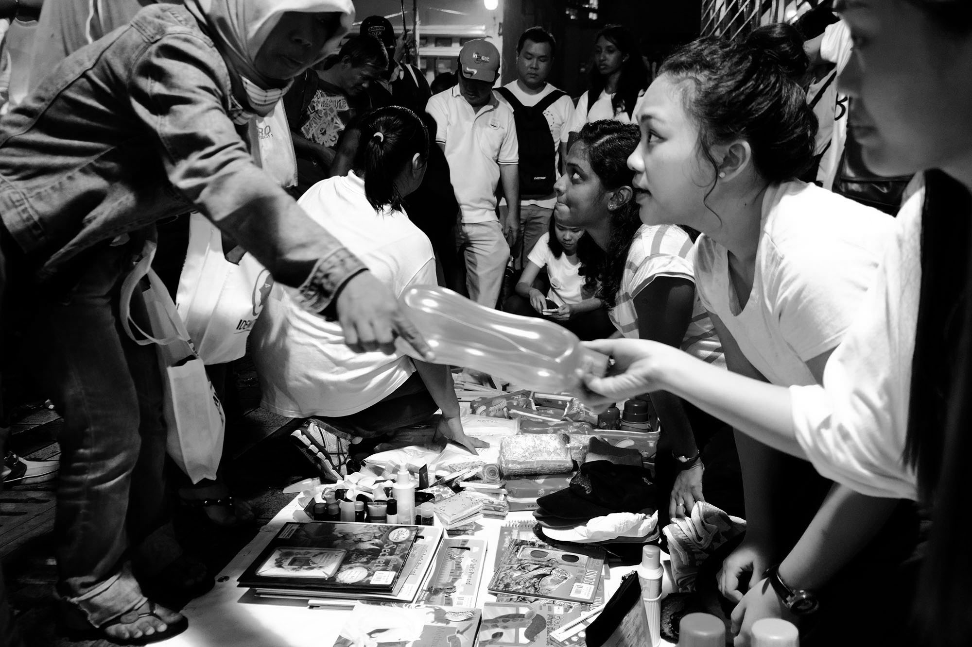 Volunteers from Syed Azmi's Free Market Movement manning the stalls that offered supplies to the homeless in KL (Photo by Kamal Sellehuddin/Coconuts KL)