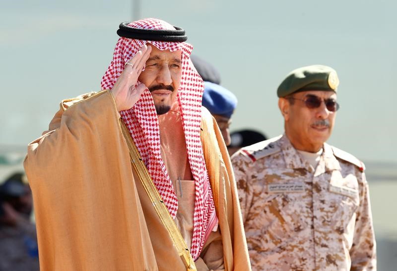 Saudi King Salman salutes as he attends a graduation ceremony and air show marking the 50th anniversary of the founding of King Faisal Air College in Riyadh, Saudi Arabia, January 25, 2017. REUTERS/Faisal Al Nasser –