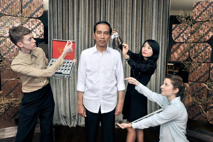 President Joko WIdodo getting measured for his statue. Photo: Madame Tussauds