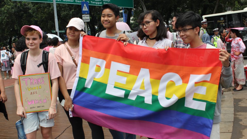 Protesters carrying a pro-LGBT sign during the Jakarta Women’s March in 2017. Photo: Coconuts Media / Andra Nasrie