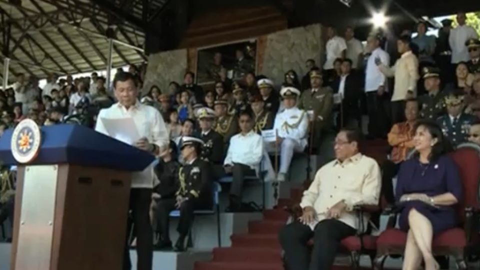 President Rodrigo Duterte shares a light moment with Vice President Leni Robredo at the PMA commencement exercises this Sunday morning. PHOTO: Screengrab from PCO live stream
