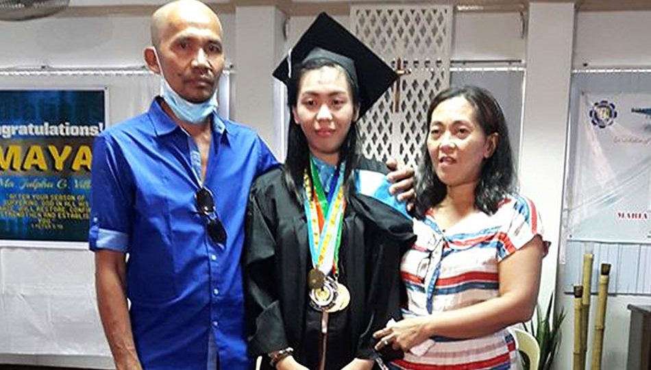 As her parents watched, Maria Julpha Villa receives her college diploma inside the hospital where she is confined. PHOTO: ABS-CBN News/Joey Taguba Yecyec