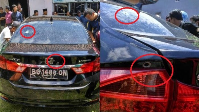 The victims’ car, ridden with bullet holes. Photo: Twitter