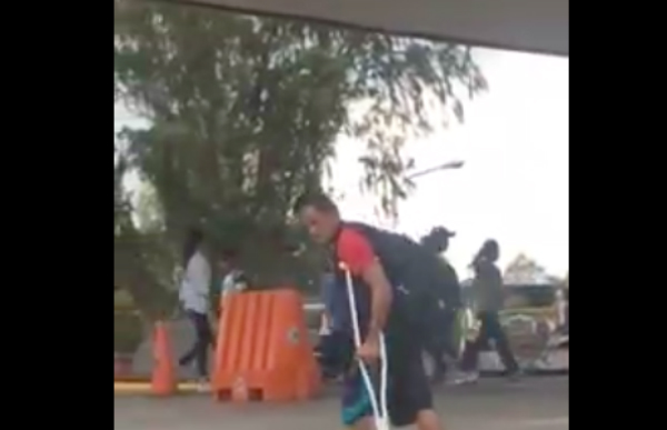 The beggar scratched the female driver’s car because she did not give him money. PHOTO: Facebook/Cy Villanueva-Pasion
