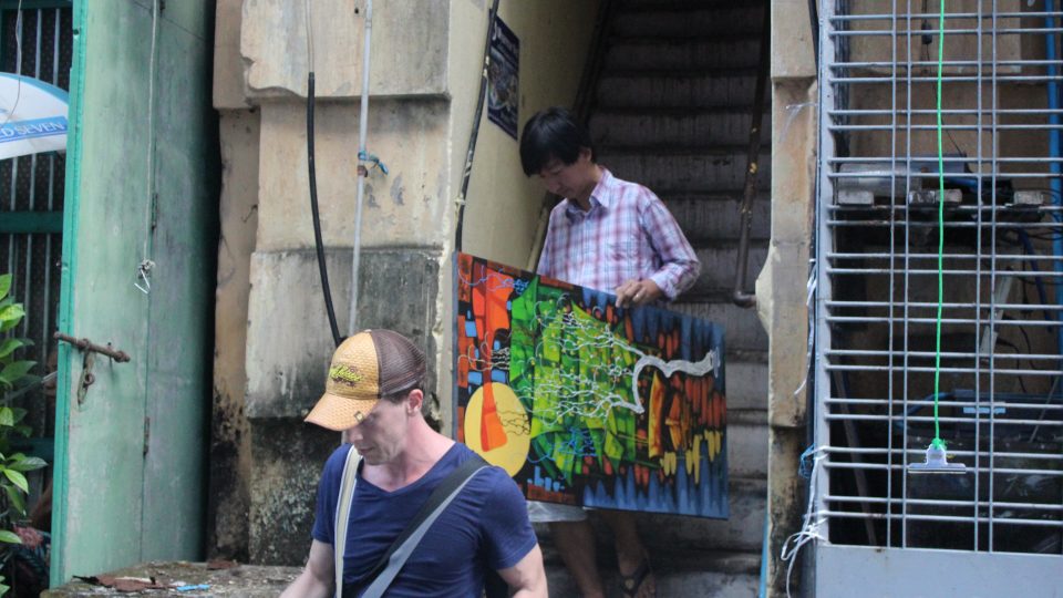Binotti’s friends, assisted by Yangon law enforcement, remove items from his apartment the day after he fled the country. Photo: Jacob Goldberg