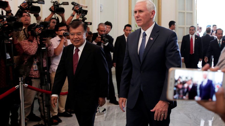 U.S. Vice President Mike Pence (R) walks with Indonesia’s Vice President Jusuf Kalla at the Vice President office in Jakarta, Indonesia April 20, 2017. REUTERS/Beawiharta