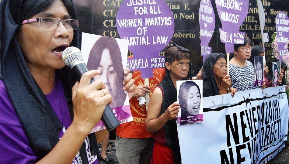 Activists and family of Martial Law victims pay tribute to the women victims of martial law in commemoration of the International Women’s Day at the Bantayog ng mga Bayani. The group called for justice for those who suffered and were killed during the martial rule. FILE PHOTO: ABS-CBN News