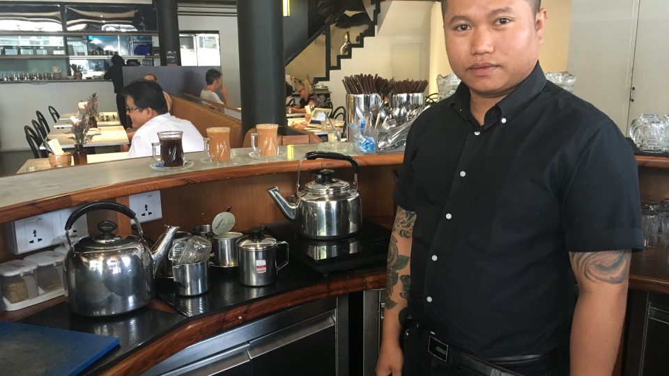 Aung Zin Moe at his workstation. Photo: Coconuts Yangon / Moe Thet War