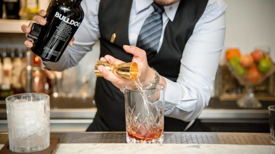 A Negroni being artfully prepared at Sorrento Sathorn.